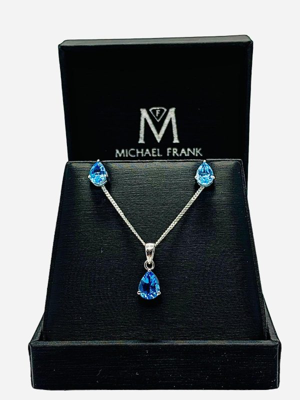 Silver Blue Topaz Pear Cut Pendant and Earring Set