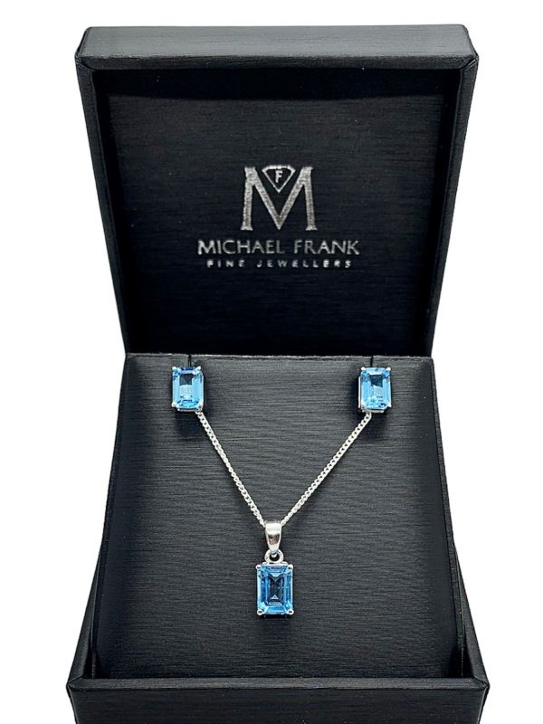 Silver Blue Topaz Emerald Cut Pendant and Earring Set