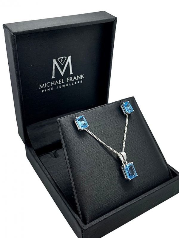 Silver Blue Topaz Emerald Cut Pendant and Earring Set