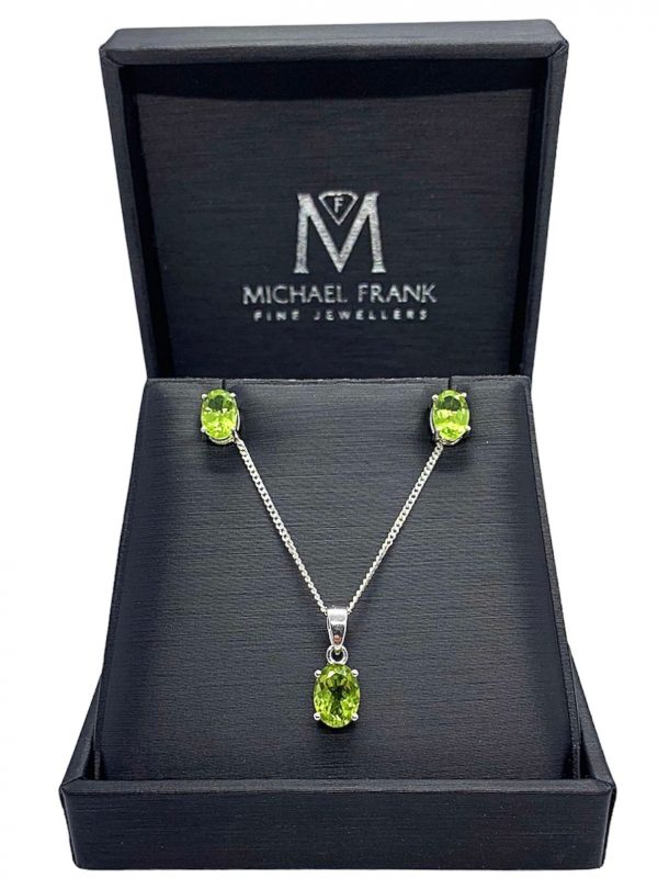Silver Peridot Oval Cut Pendant and Earring Set